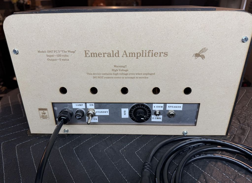 Back panel of a vintage Emerald Amplifiers model 1947 FC5 "The Wasp" with controls and power cable.