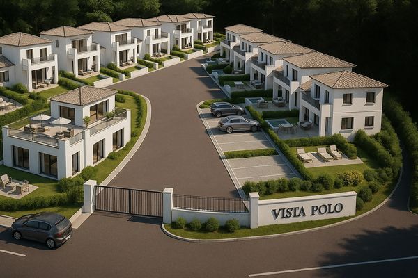 Gated residential community named Vista Polo with modern houses and parking.