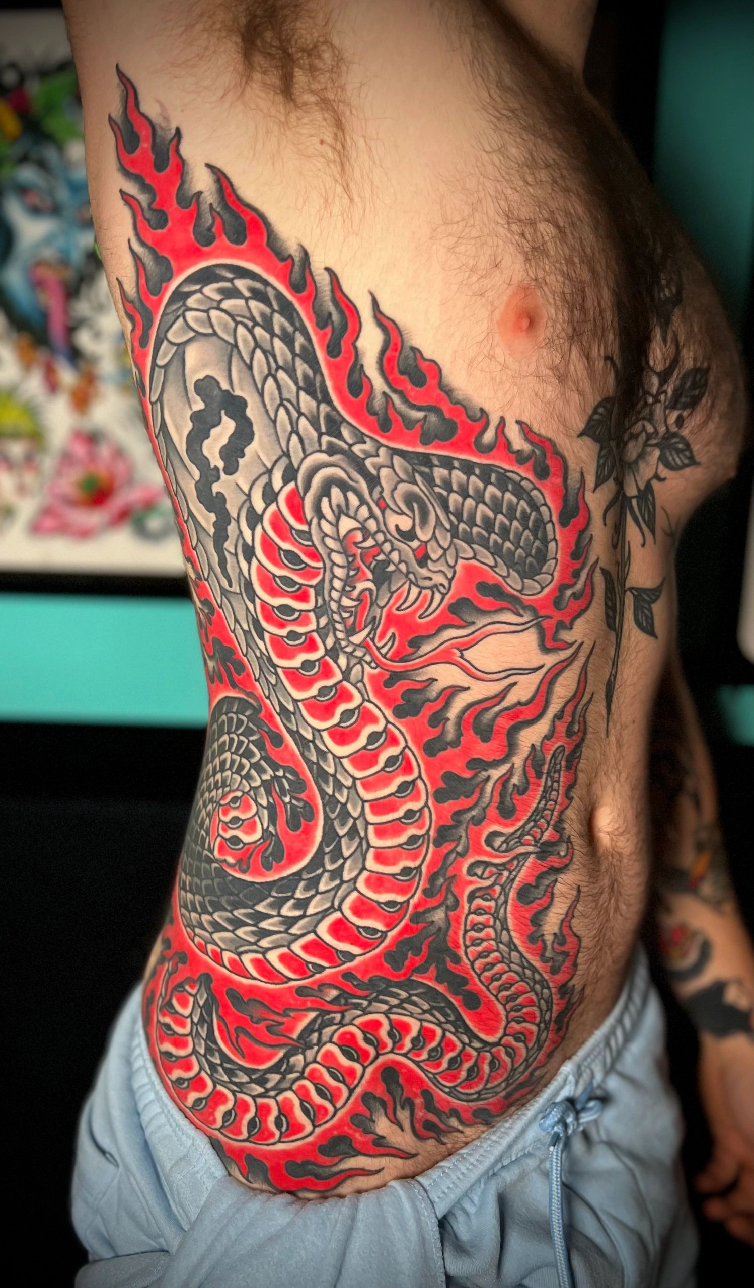 Cobra rib tattoo