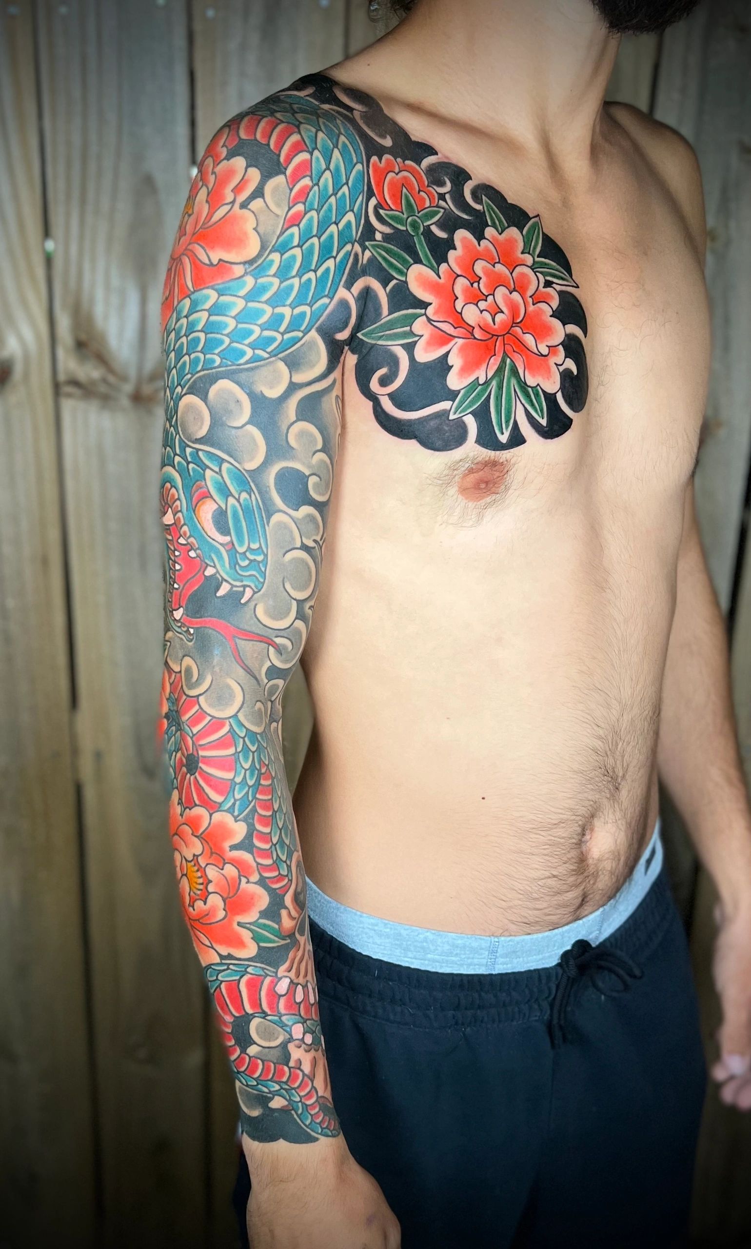 Snake and peony full sleeve Japanese irezumi tattoo