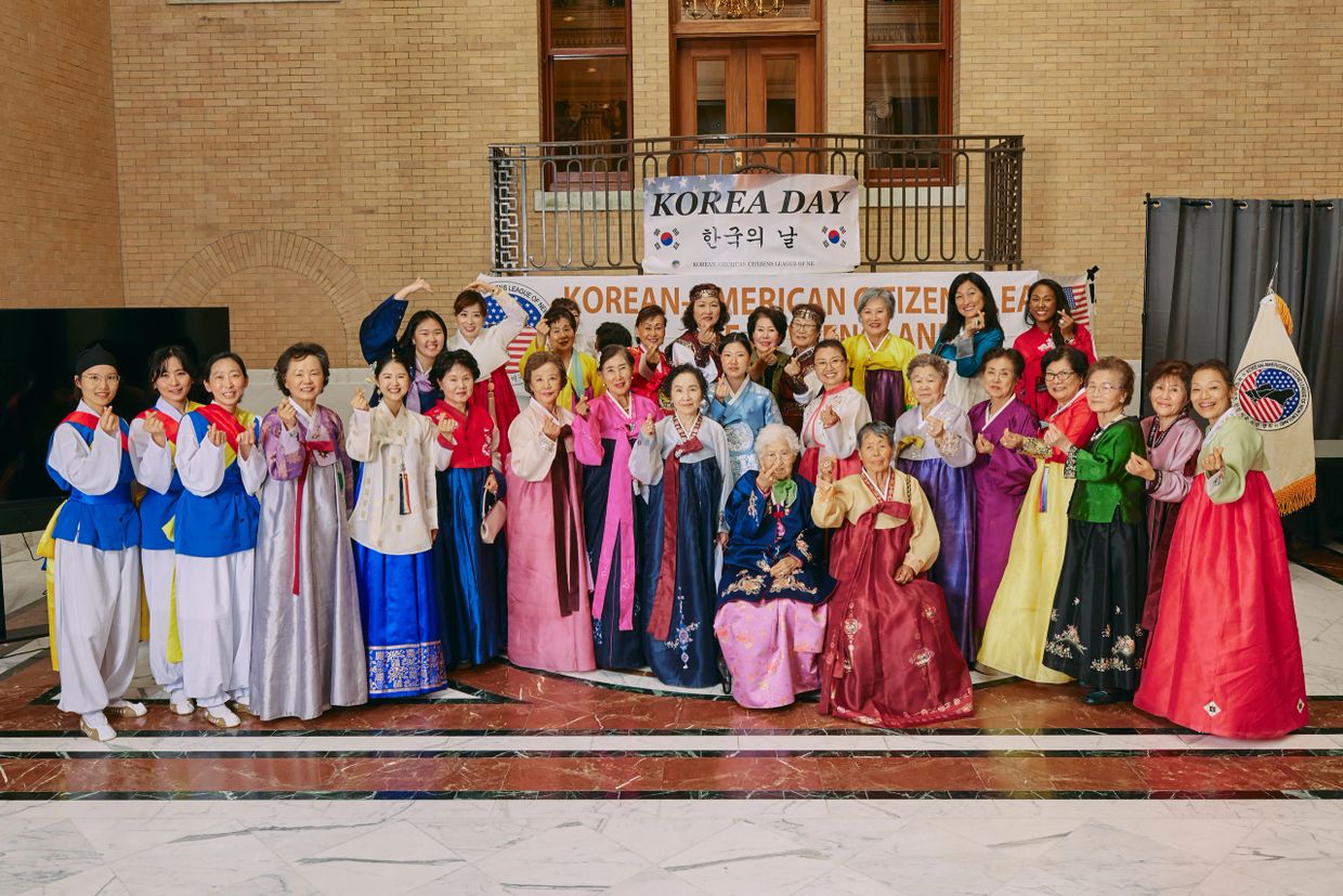 Group of Korean women in traditional hanbok celebrating Korea Day.