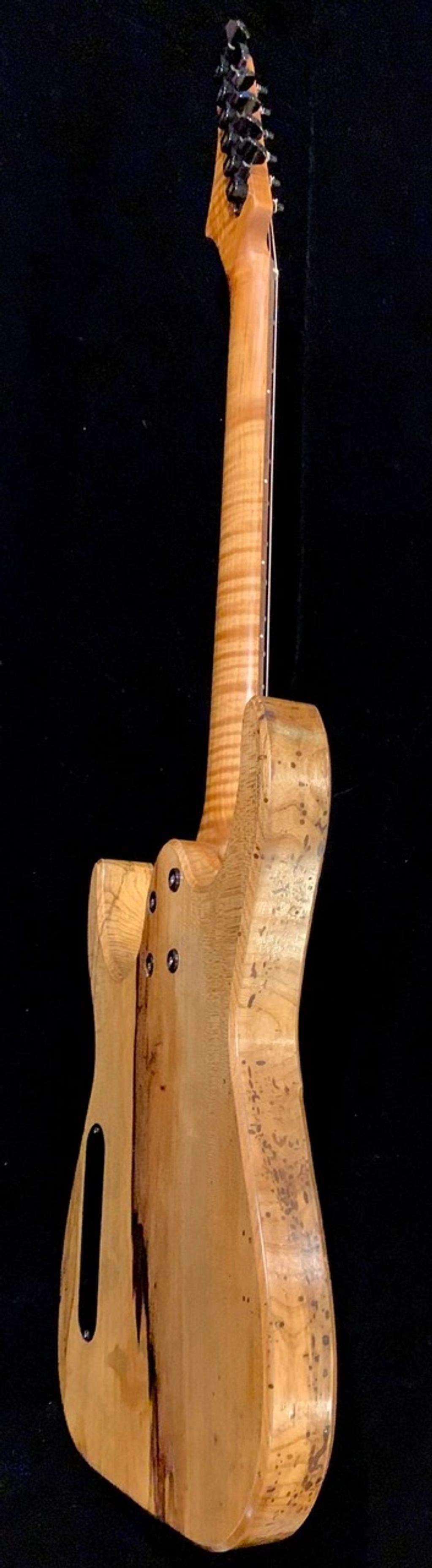 Flamed, roasted maple neck 