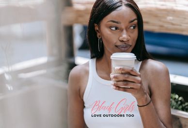 Stay cool, confident, and stylish in our Women’s White Tank Top featuring our signature logo. Made f