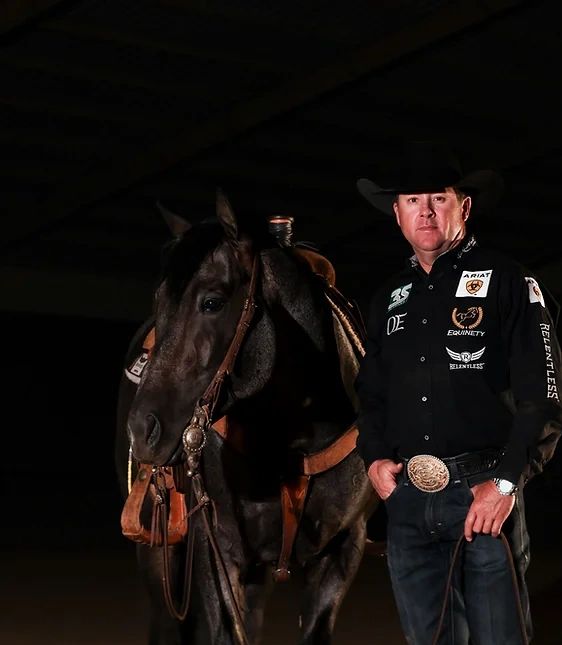 Trevor Brazille with AQHA World Champion The Darkk Side