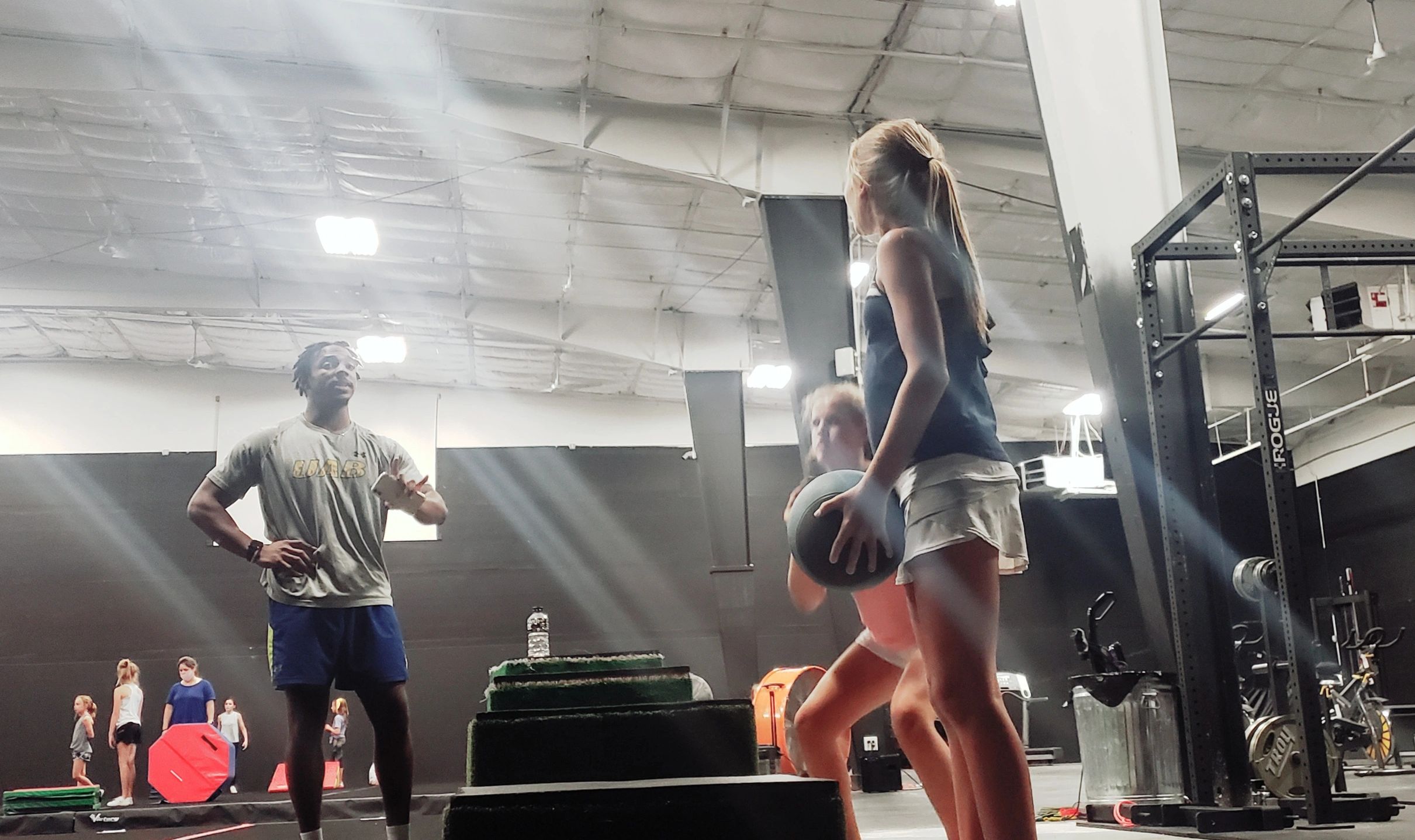 Tumble-Fit athletes
BlackWatch Cheer in Birmingham, Alabama listening to a coach give instructions