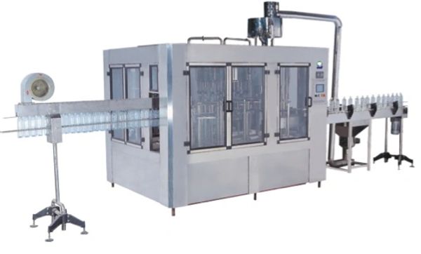 Automated bottle filling and packaging machine.
