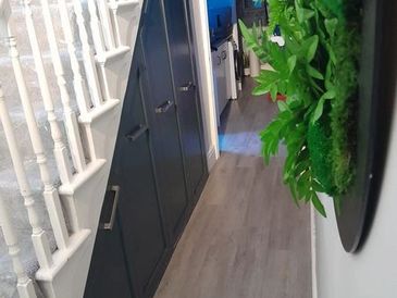 Handcrafted under-stairs storage solution by a professional Isle of Man carpenter