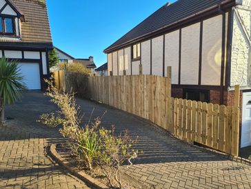 Custom garden fencing and timber gate installation by MJD Joinery, Isle of Man