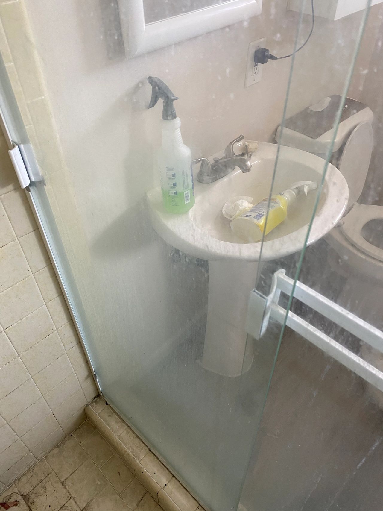 How to Remove Hard Water Stains From a Glass Shower