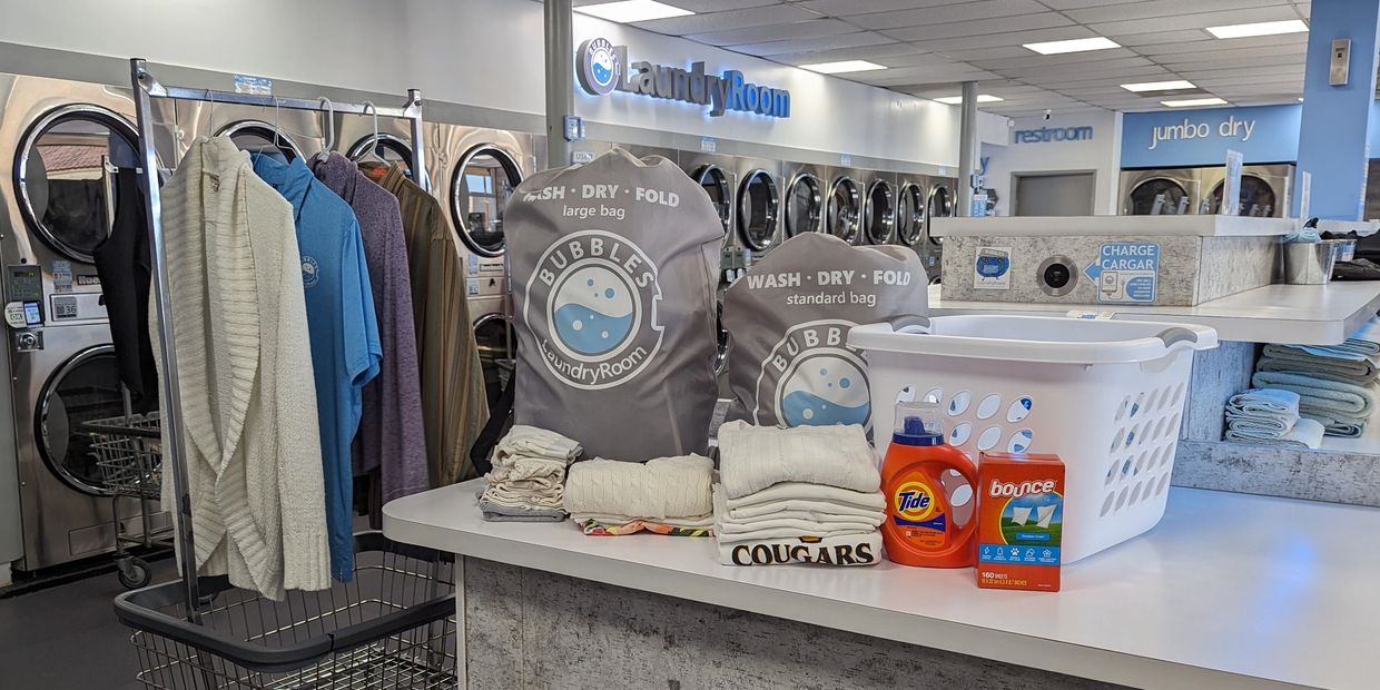 Bubbles Laundry Service. We include the detergent, fabric softener, and dryer sheets. 