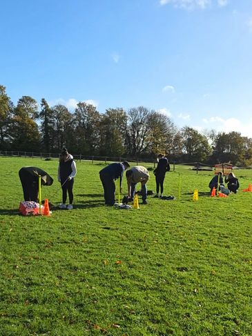 img src="Dog-training-classes.jpg"
alt="dog owners and their puppies learning new behaviours"