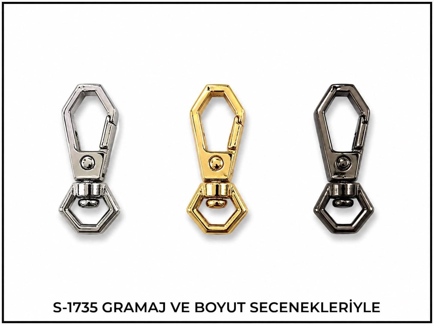 Üç farklı renk metal kancalar sırayla dizilmiş.