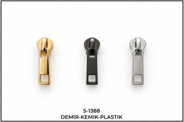 Üç farklı renk metal fermuar başlığı: altın, siyah ve gümüş.