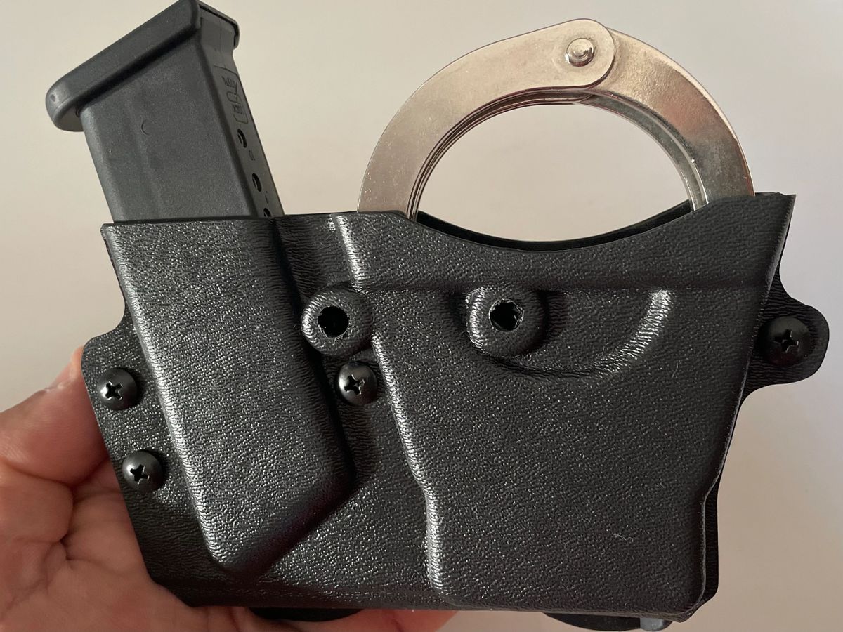 Deepconcealment handcuff/ mag combo carrier