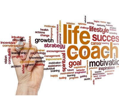 Hand writing life coach word cloud with marker.
