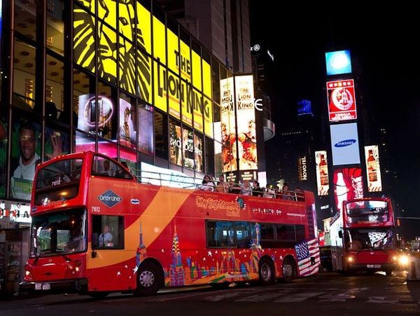 famous,Time squre at night with crowds and traffi