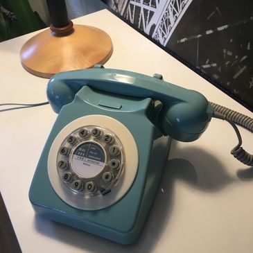 a telephone on a desk 