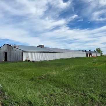Old barn shop being survey for demolition in Crossfield Alberta