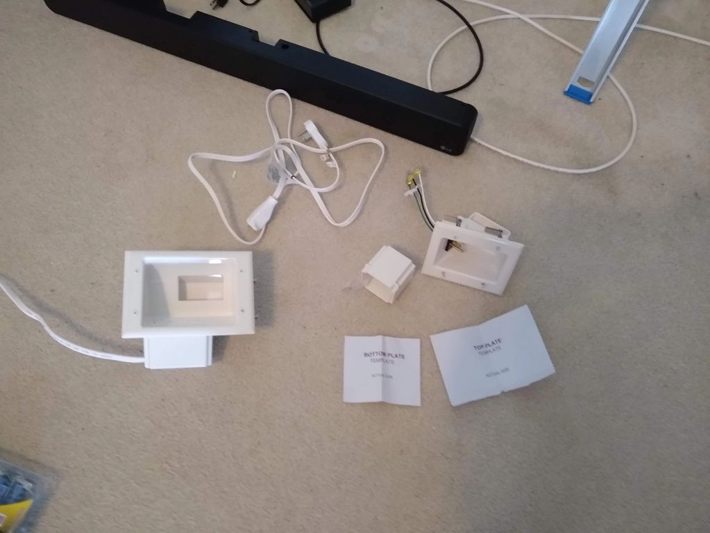 Parts to install outlet behind tv.