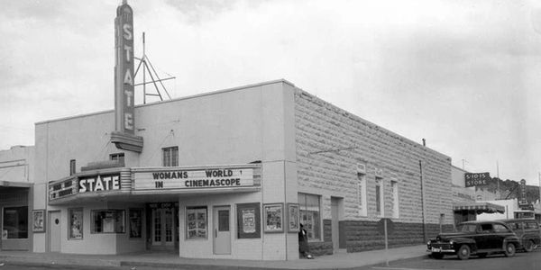 Black and white photo of the State Theatre showing 'Woman's World' in Cinemascope.