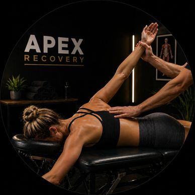 Woman receiving a therapeutic back massage at Apex Recovery.