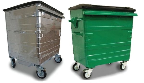 Two large wheeled trash bins, one metallic and one green.