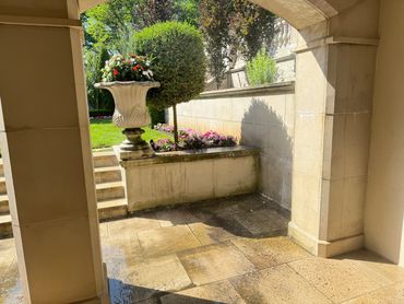 Pressure washing patio before cleaning