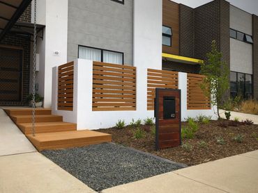 Front courtyard wall with Modwood features and Modwood front steps