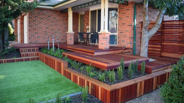 Merbau decks with matching retaining walls