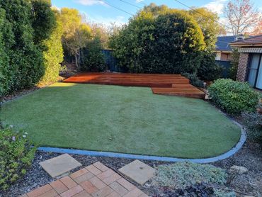 Spotted gum deck and artificial lawn