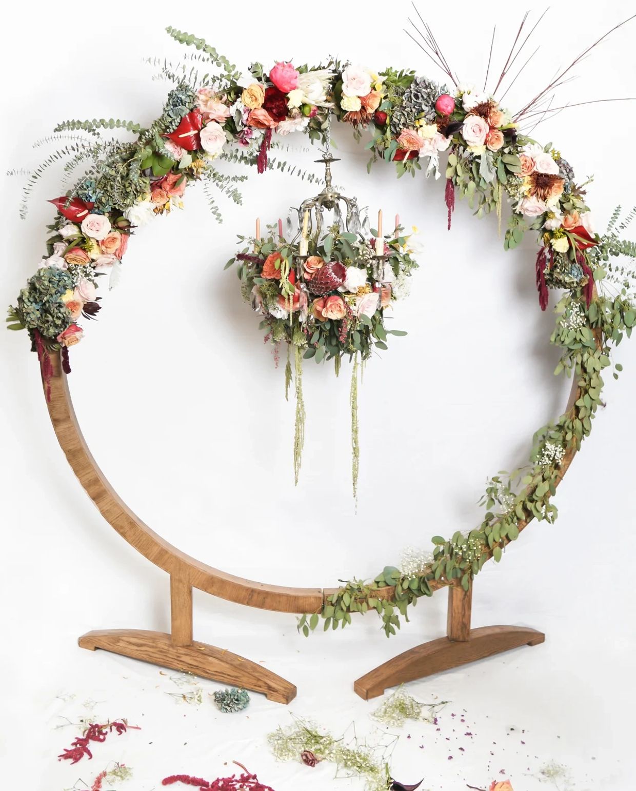 a wedding arch decorated with flowers