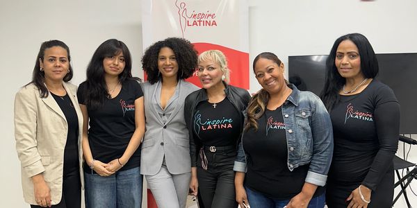 Group of six women standing together at an Inspire Latina event.