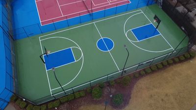 We converted and tennis court to a full basketball court for an HOA in Cumming, GA