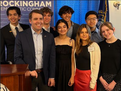 Group photo of young professionals at an event.