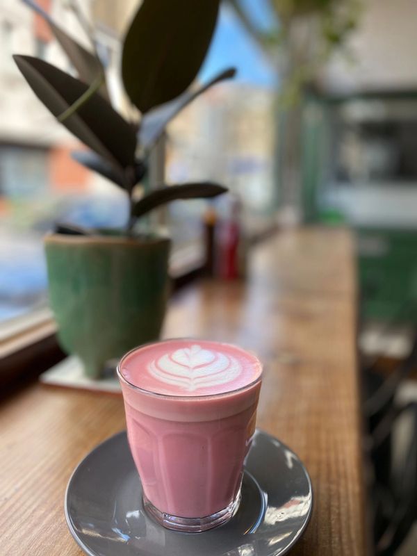 Beetroot latte on the counter.
