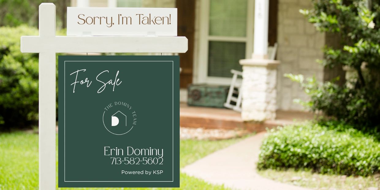 Real estate sign with 'Sorry, I'm Taken!' and 'For Sale' messages.