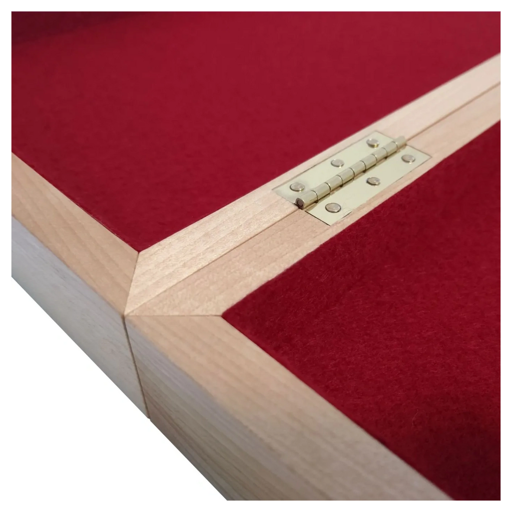 Chess Board folded open, showing the maple box frame with brass hinges and red wool felt lining.