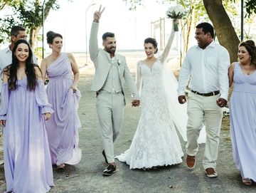Photo by Jonathan Borba: https://www.pexels.com/photo/a-group-of-people-in-white-dresses-walking-dow