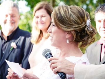 Photo by Mario  Schafer: https://www.pexels.com/photo/a-woman-giving-a-speech-during-a-wedding-10184