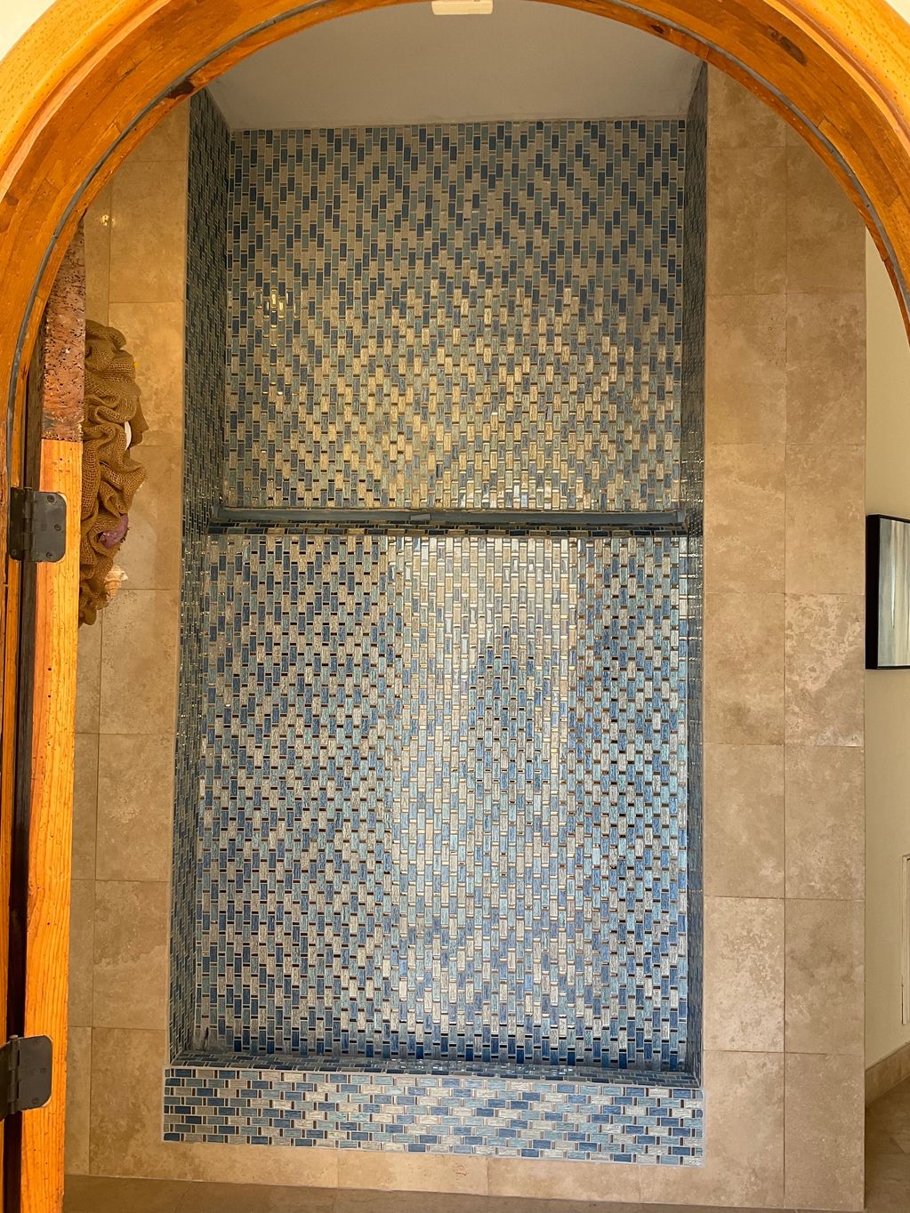 A mosaic tiled wall