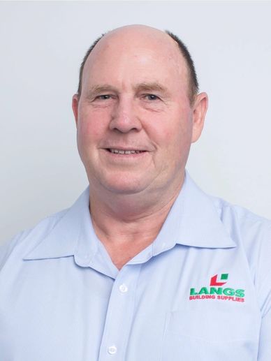 Portrait of a man wearing a Langs Building Supplies shirt.