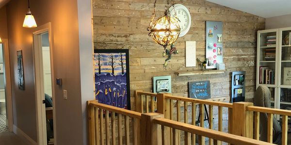 A feature wall made from up-cycled floorboard I reclaimed during this renovation.
