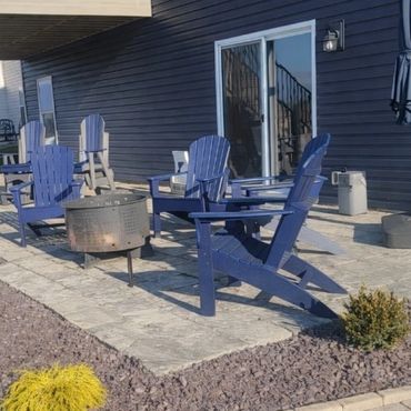 Functional paver patio under a deck