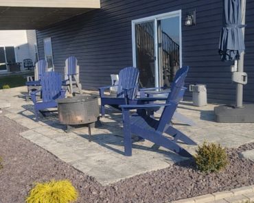 Functional paver patio under a deck