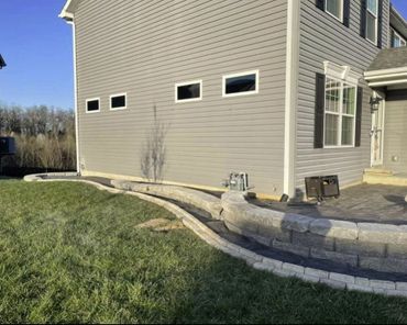 Aesthetic retaining wall and brick edging