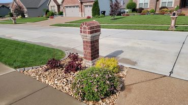 Edging, and plantings designed and installed by Classic Landscape