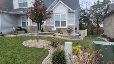 Retaining Wall, edging, and plantings designed and installed by Classic Landscape