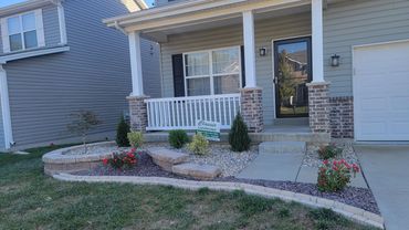 Retaining Wall, edging, and plantings designed and installed by Classic Landscape