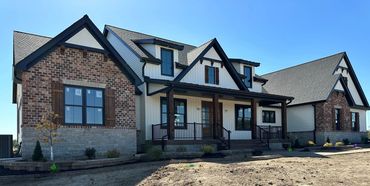 Retaining Wall, edging, and plantings designed and installed by Classic Landscape