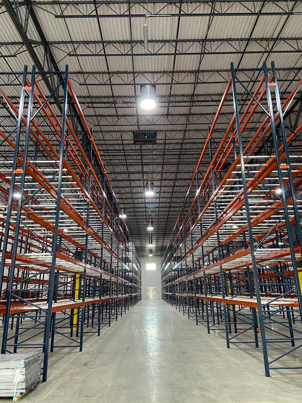 Solatube tubular daylighting devices in warehouse aisle